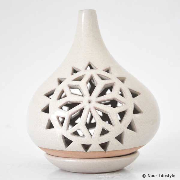 http://myshop.s3-external-3.amazonaws.com/shop1026900.pictures.terracotta-kaarshouder-bassala-beige-nour-lifestyle-2.jpg