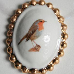 Broche roodborst klein