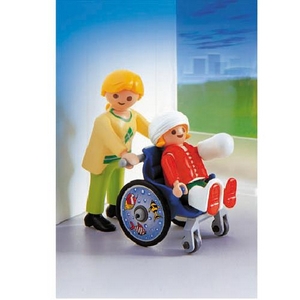 PLAYMOBIL KIND MET ROLSTOEL  uitlopend produkt