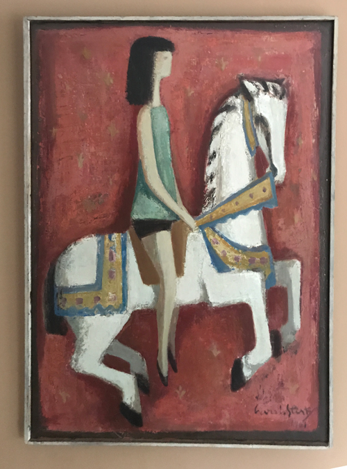 Meisje op draaimolenpaard